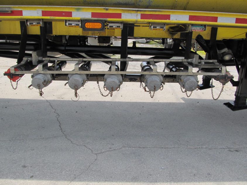 bottom load heads with vapor recovery on used tanker trailer